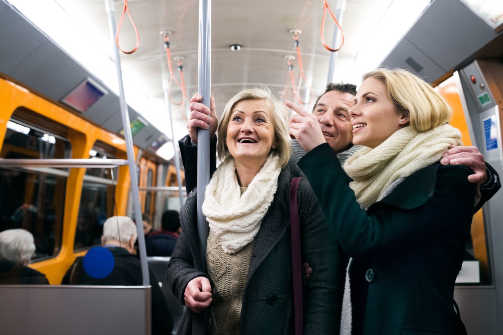 Beautiful,Family,In,Winter,Clothes,Traveling,By,Subway,Train